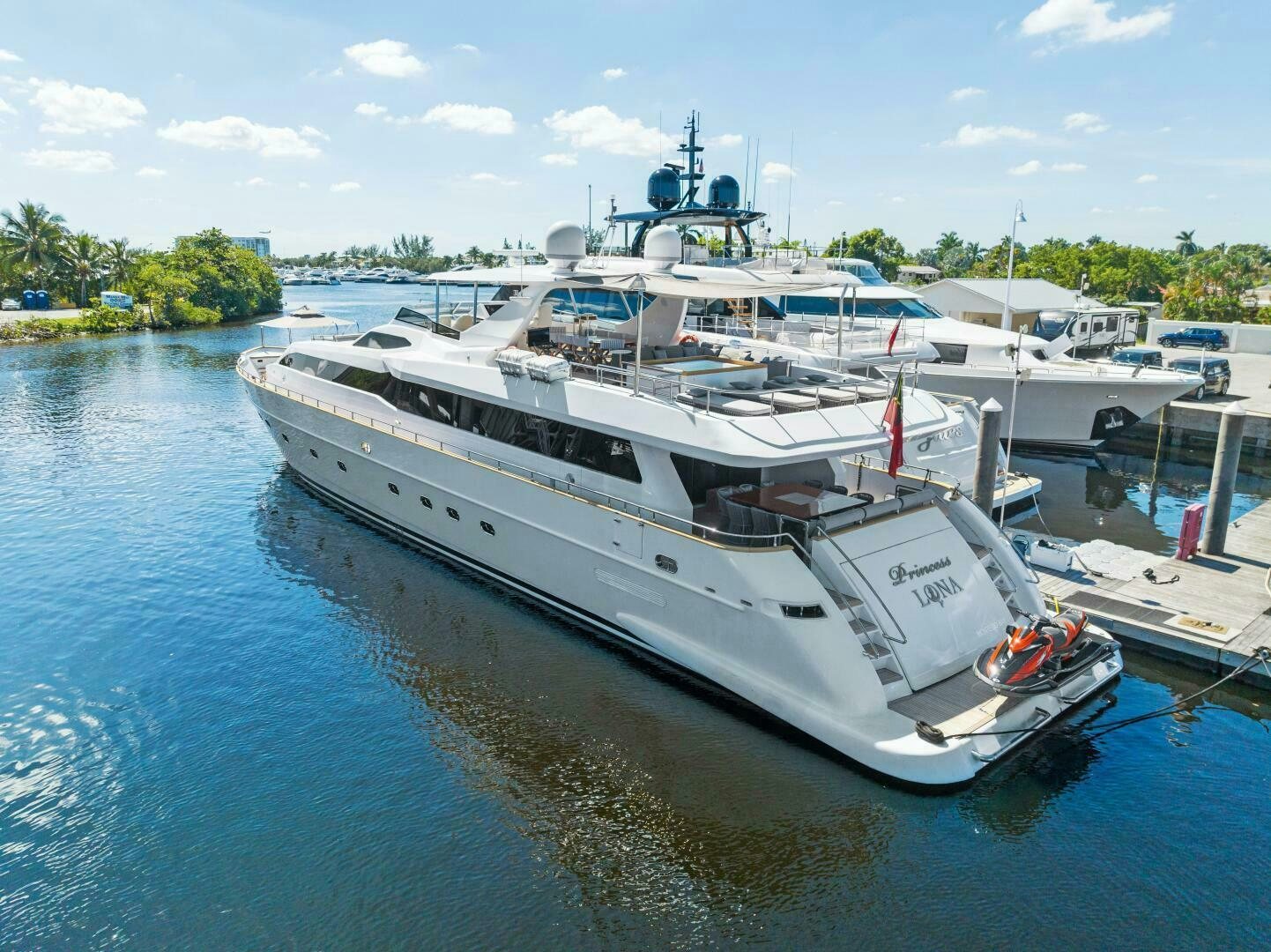 a boat docked at a pier aboard PRINCESS LONA Yacht for Sale