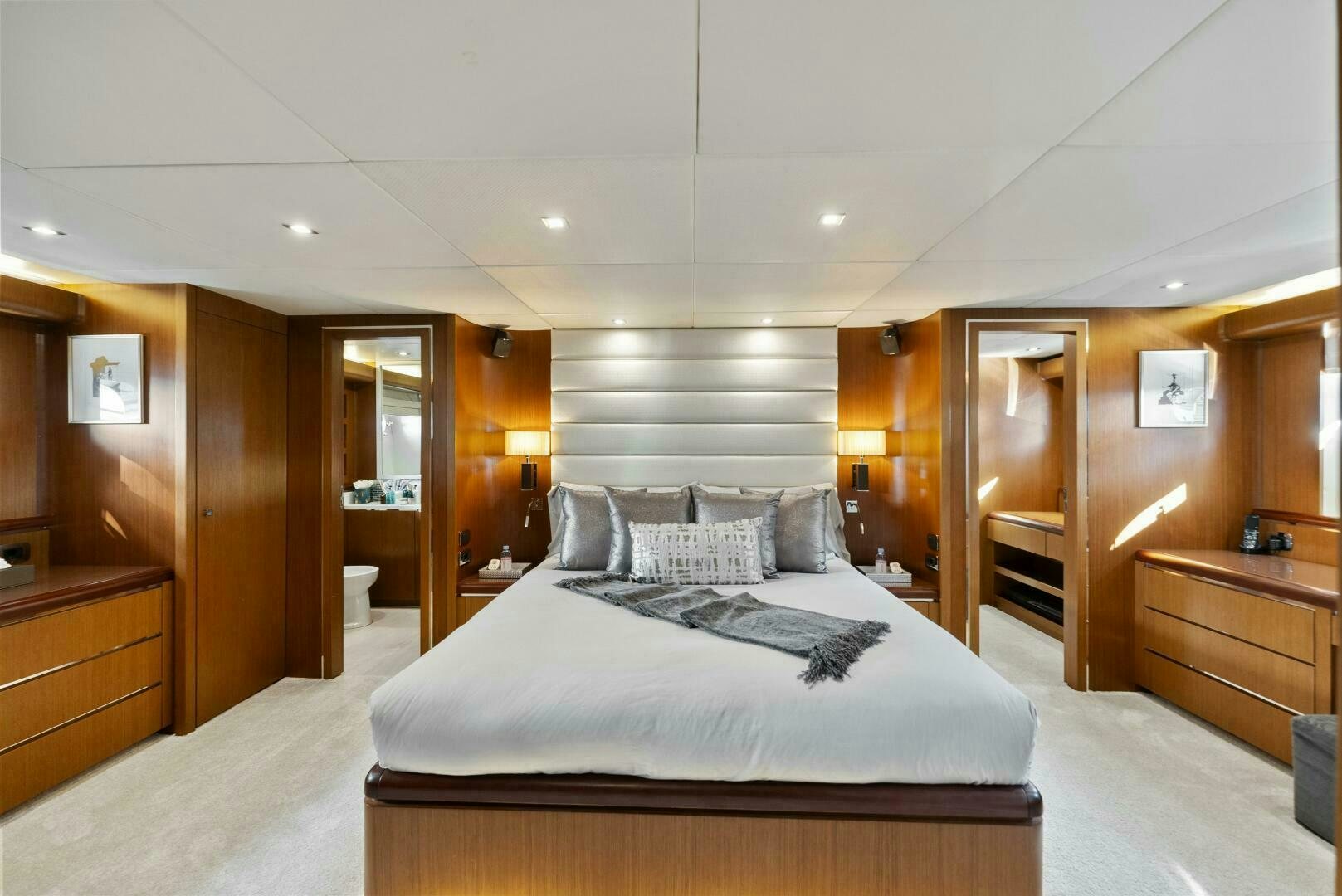 a large bedroom with a large bed aboard PRINCESS LONA Yacht for Sale