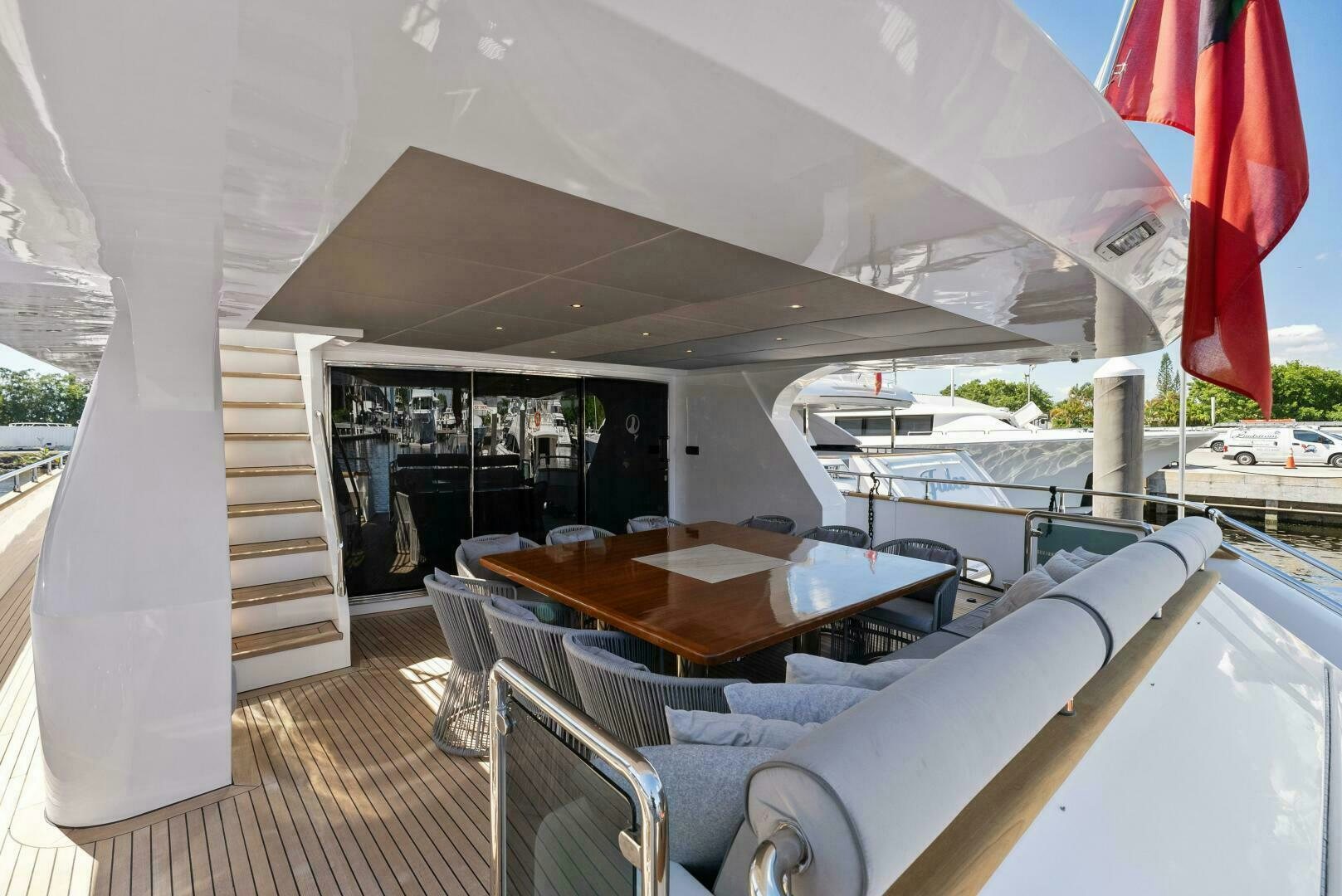 a table and chairs on a deck aboard PRINCESS LONA Yacht for Sale