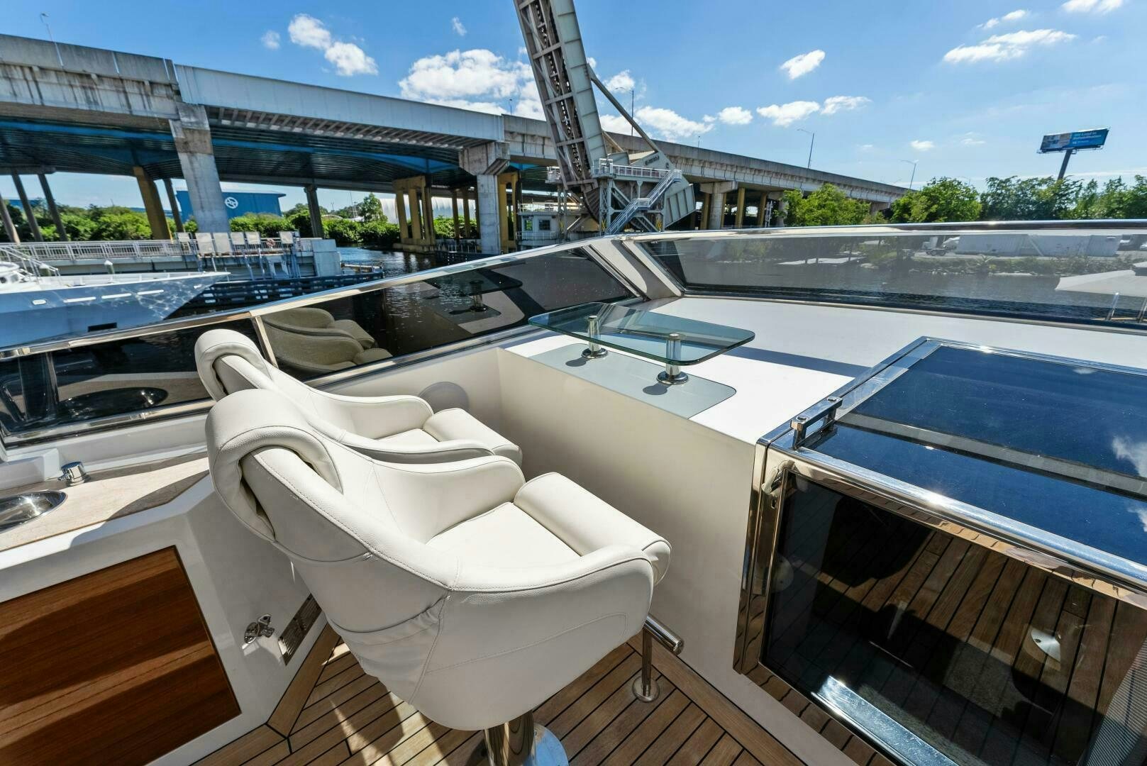 a white chair on a boat aboard PRINCESS LONA Yacht for Sale