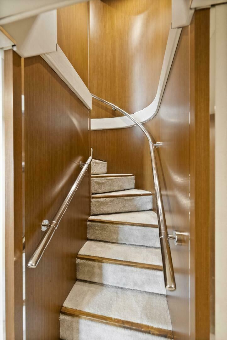 a set of stairs in a house aboard PRINCESS LONA Yacht for Sale