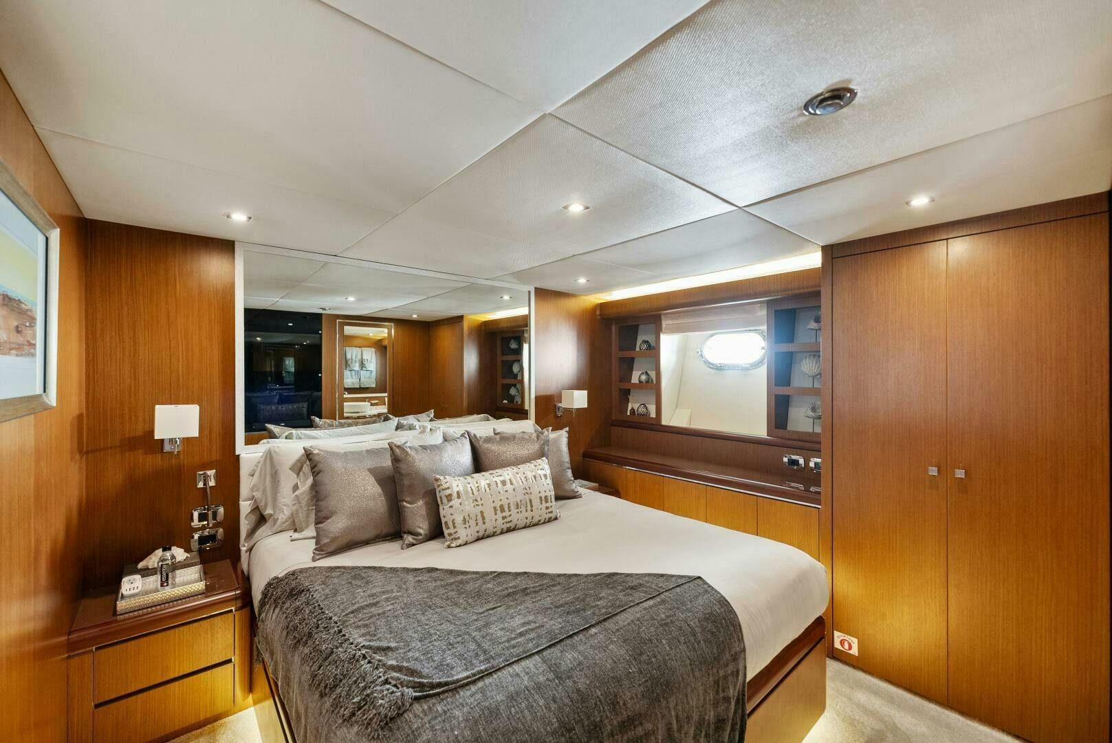a large bedroom with a large bed aboard PRINCESS LONA Yacht for Sale