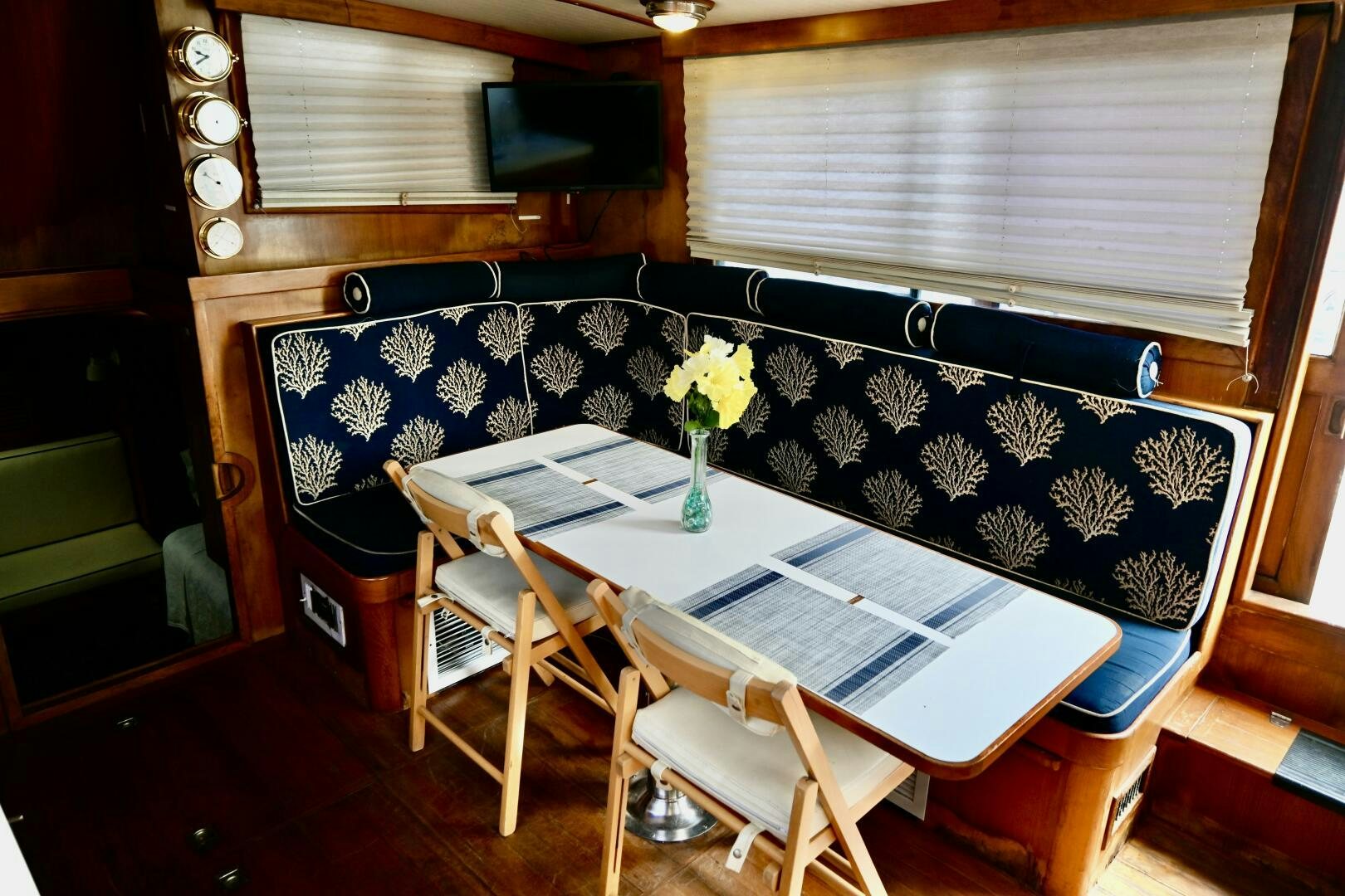 a blue and white striped couch aboard LITTLE BAYOU Yacht for Sale