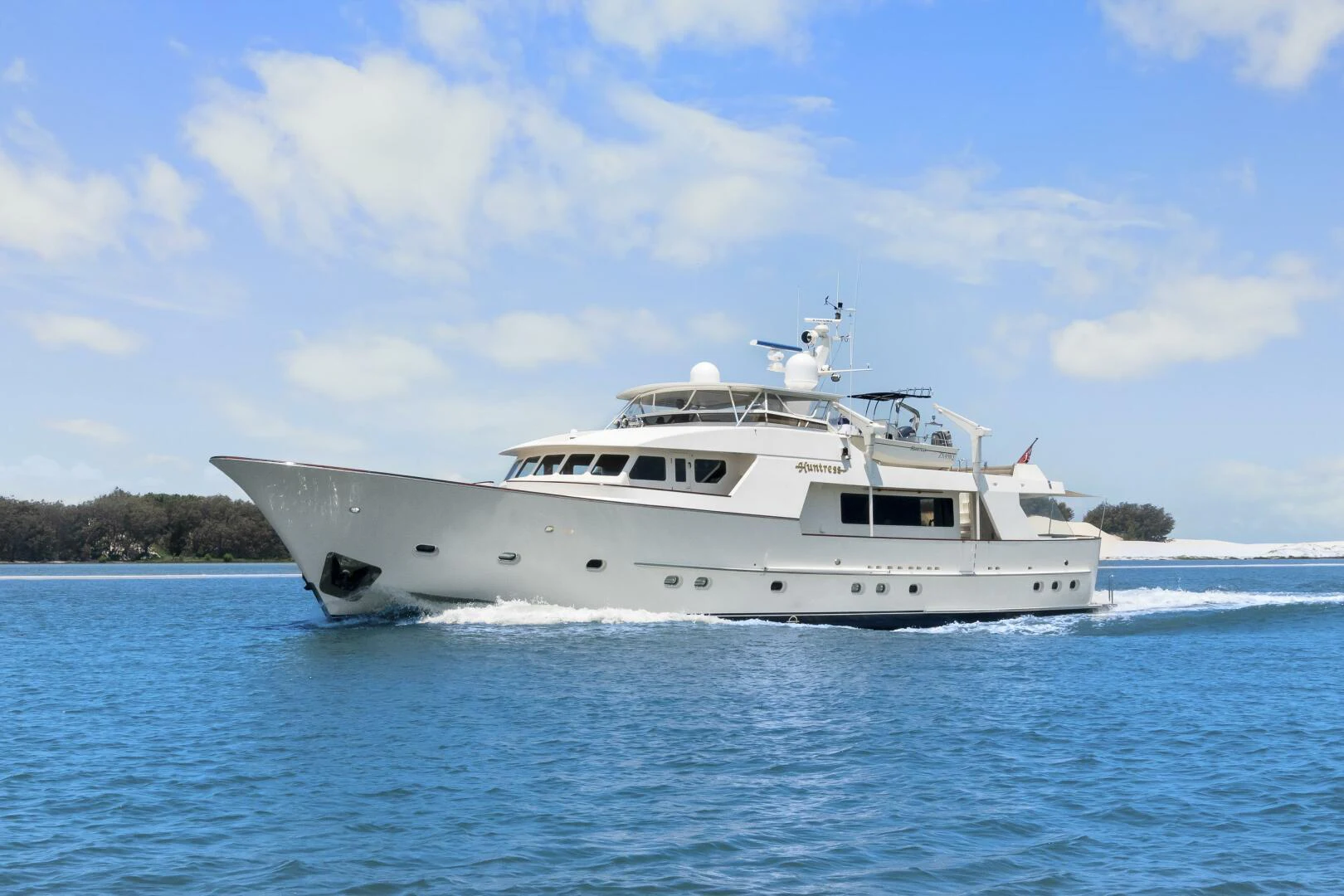 a boat on the water aboard HUNTRESS Yacht for Sale