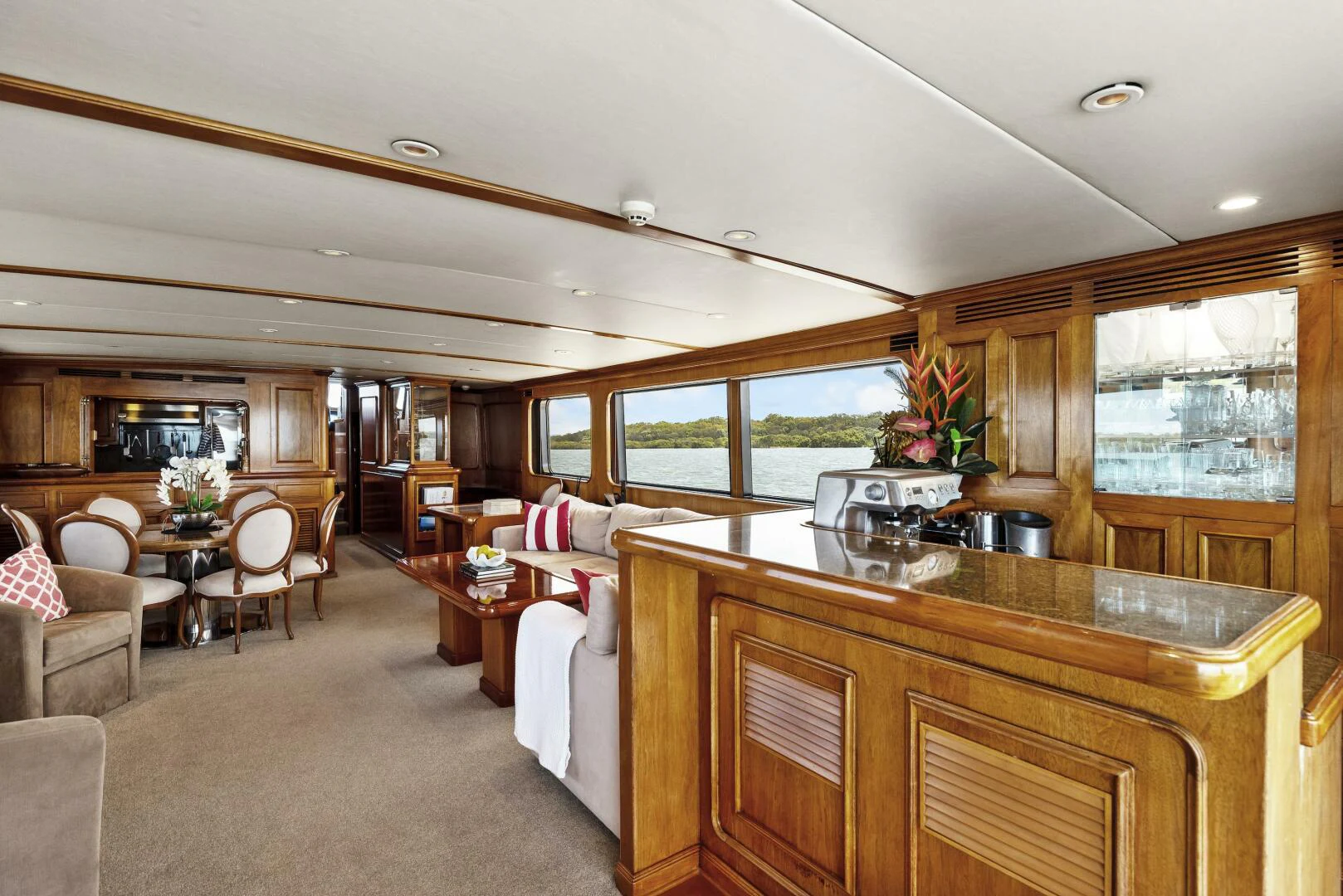 a kitchen and dining area aboard HUNTRESS Yacht for Sale