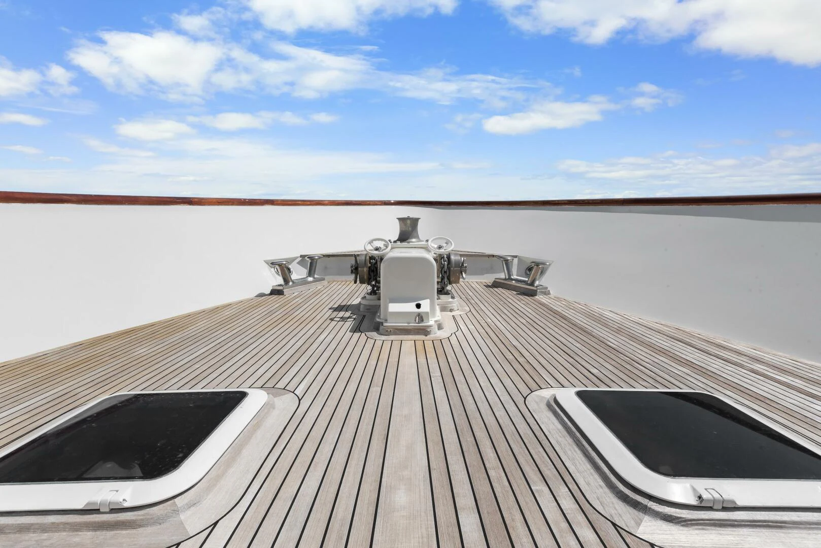 a deck with a large speaker on it and a view of the water aboard HUNTRESS Yacht for Sale