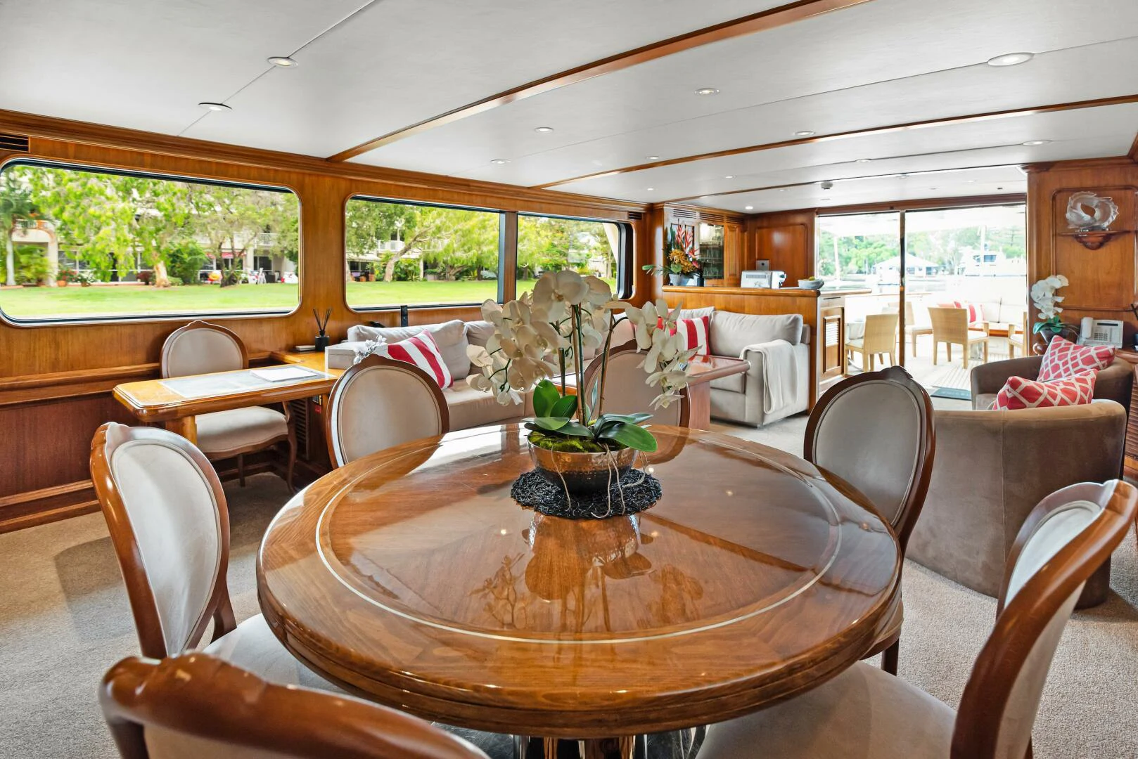 a dining table in a living room aboard HUNTRESS Yacht for Sale