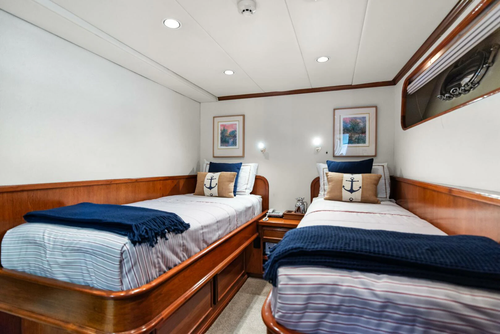 a room with two beds aboard HUNTRESS Yacht for Sale