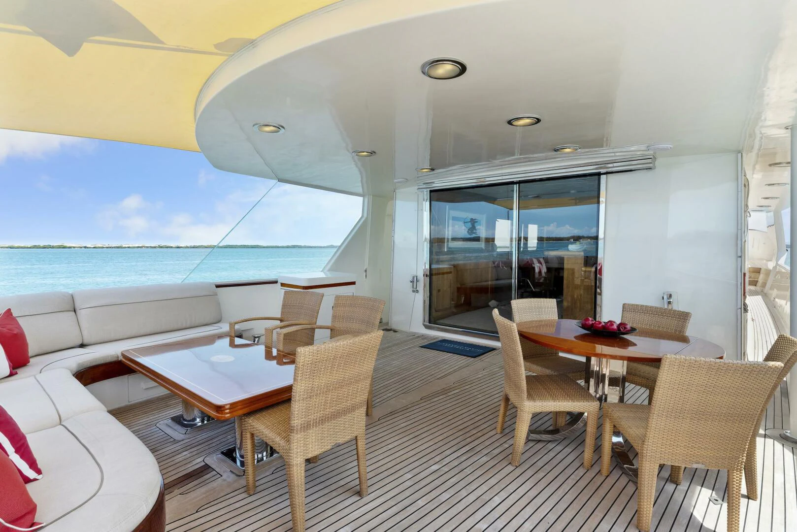 a room with a table chairs and a large window aboard HUNTRESS Yacht for Sale
