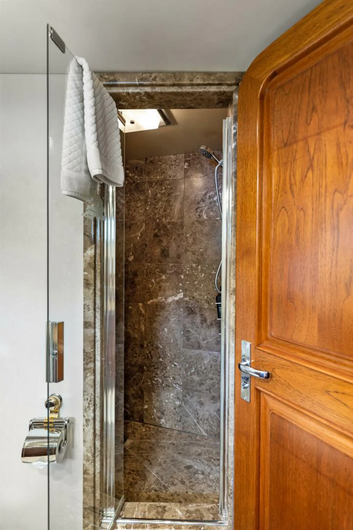 a shower with a glass door aboard HUNTRESS Yacht for Sale