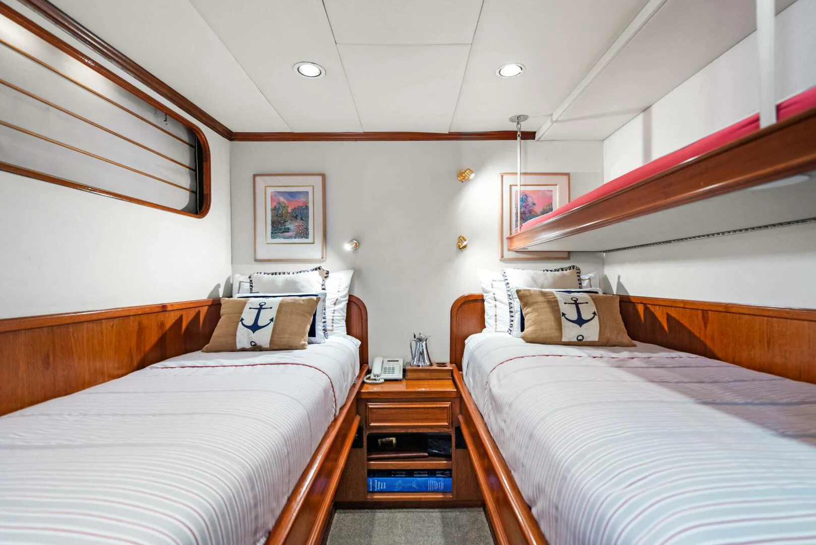 a room with two beds aboard HUNTRESS Yacht for Sale