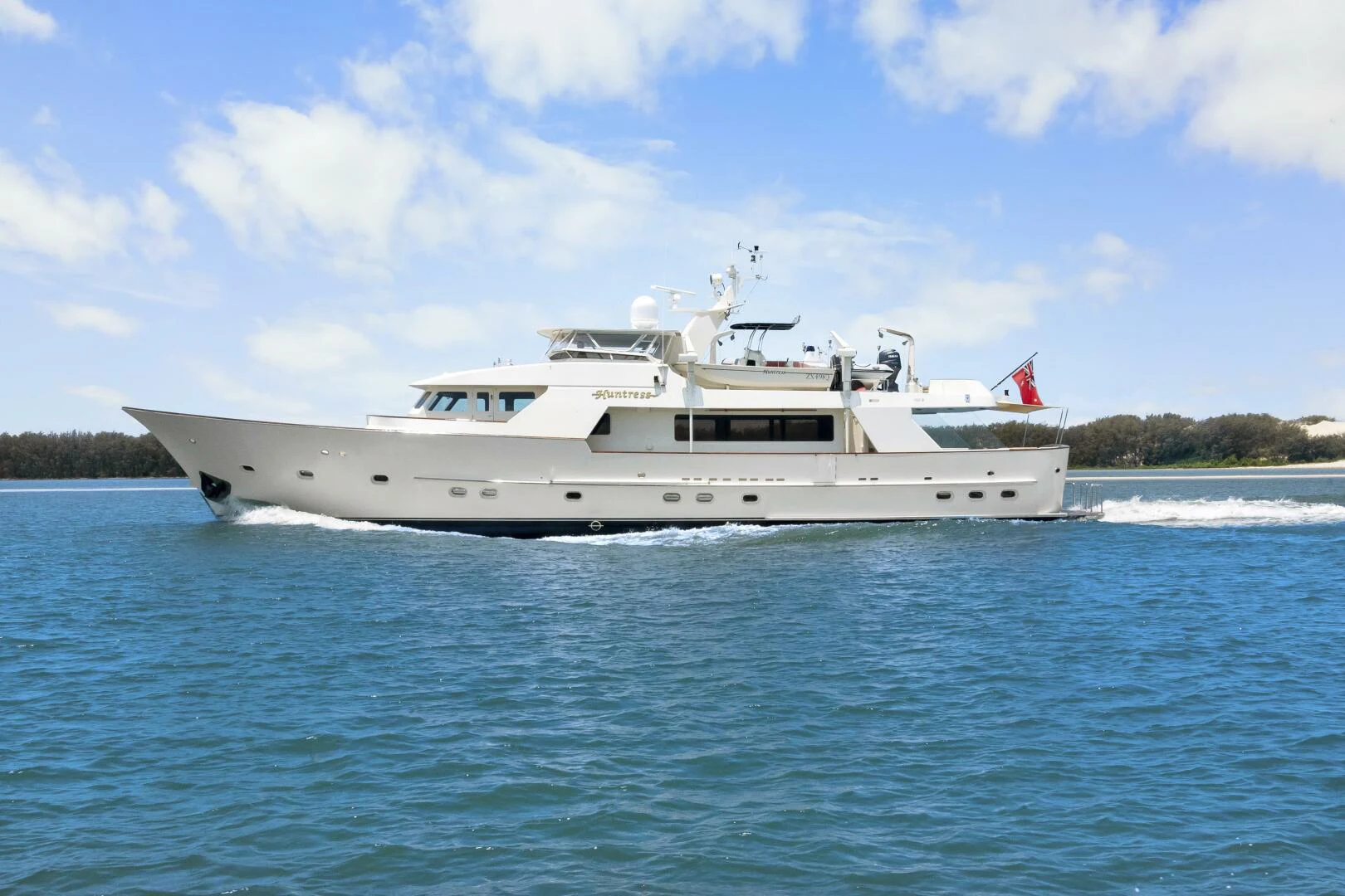 a boat on the water aboard HUNTRESS Yacht for Sale