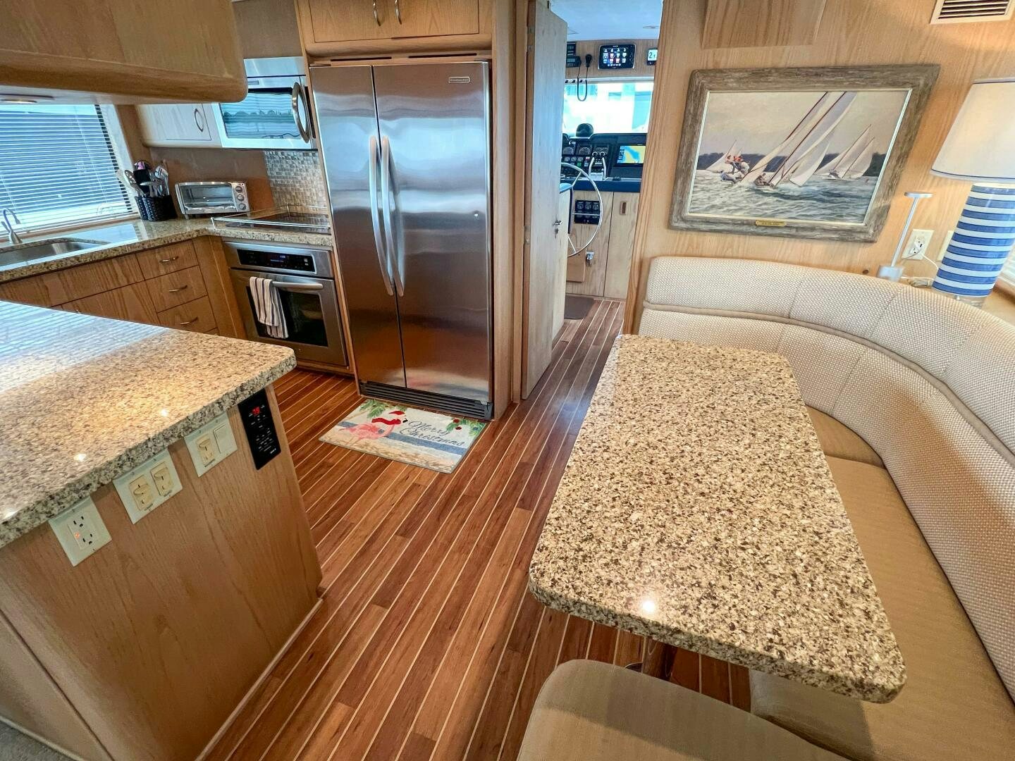a kitchen and living room aboard AT EASE Yacht for Sale