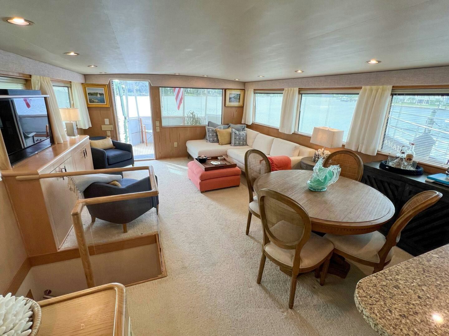 a living room with a couch and a television aboard AT EASE Yacht for Sale