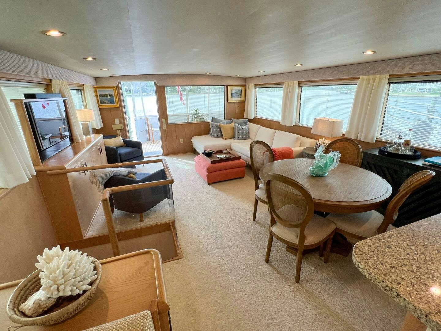 a living room with a couch and a television aboard AT EASE Yacht for Sale