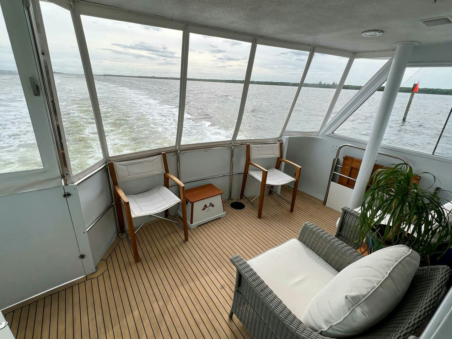 a room with a table and chairs aboard AT EASE Yacht for Sale