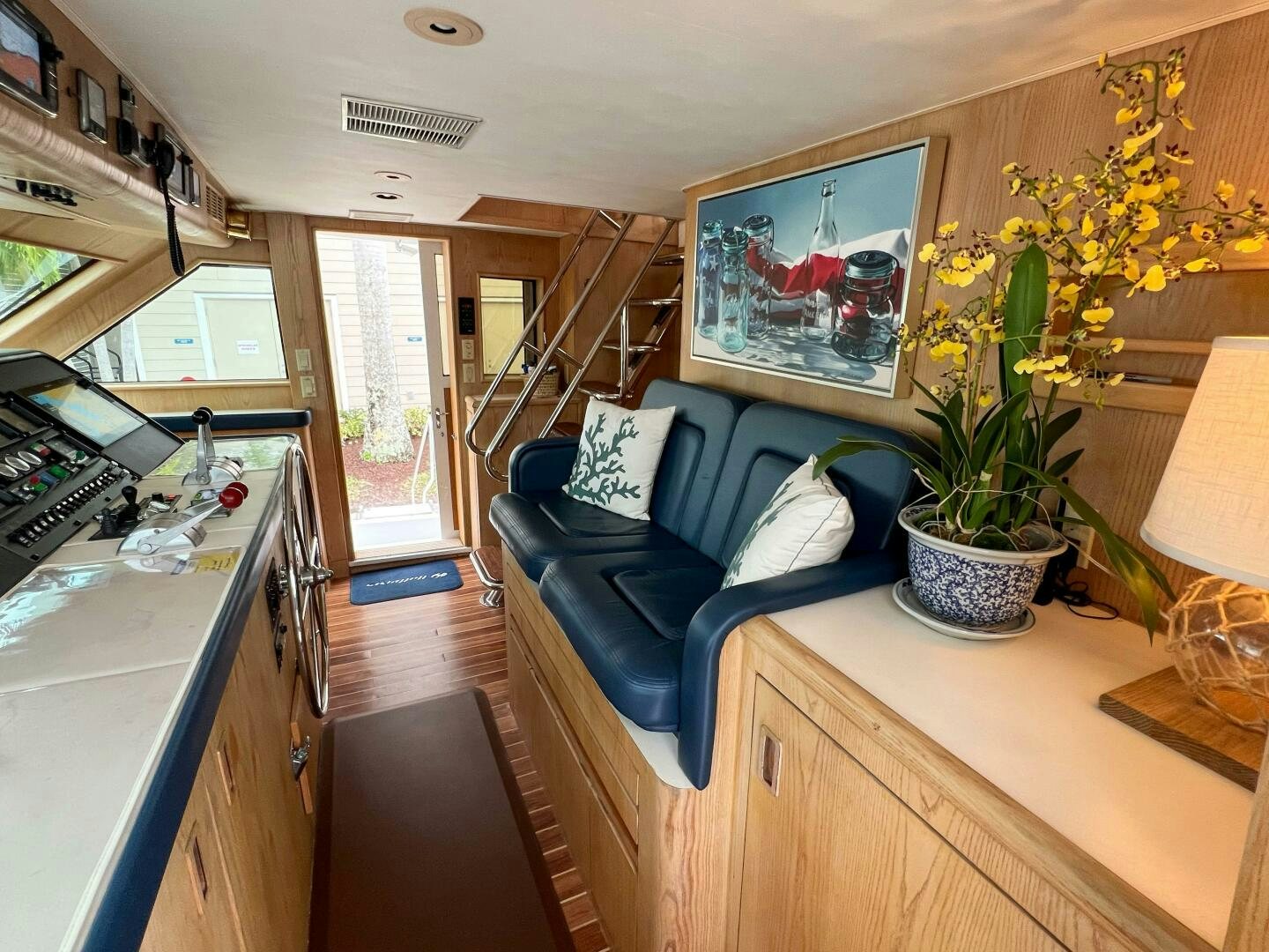 a living room with a couch and a tv aboard AT EASE Yacht for Sale