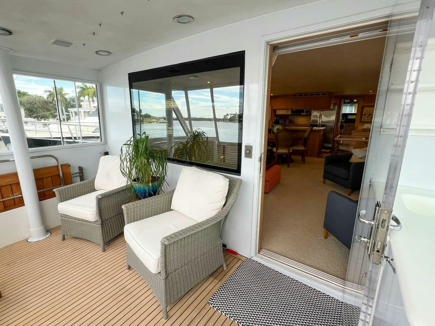 a living room with a large window aboard AT EASE Yacht for Sale