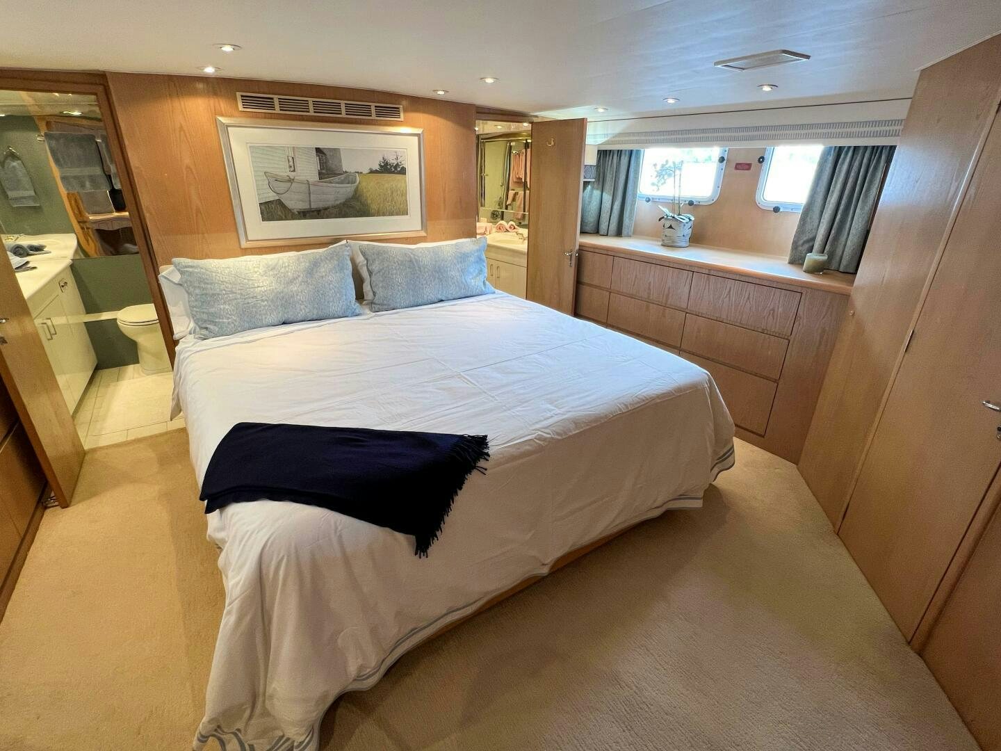 a bed in a room aboard AT EASE Yacht for Sale