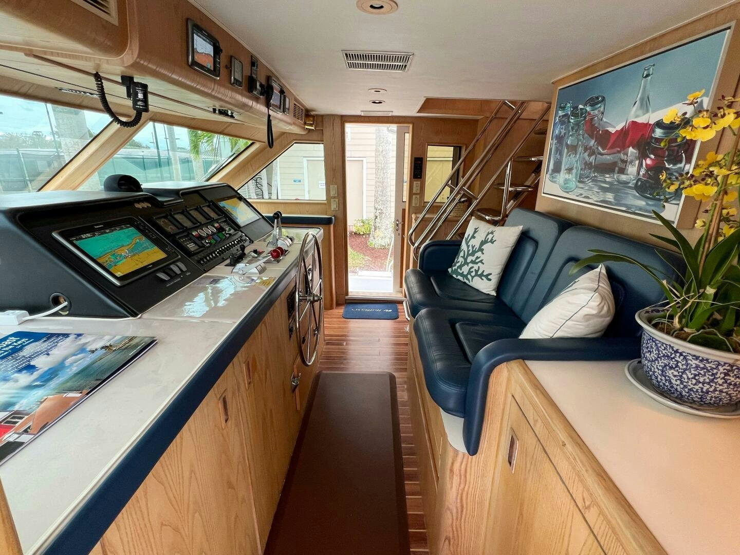 a living room with a couch and a tv aboard AT EASE Yacht for Sale