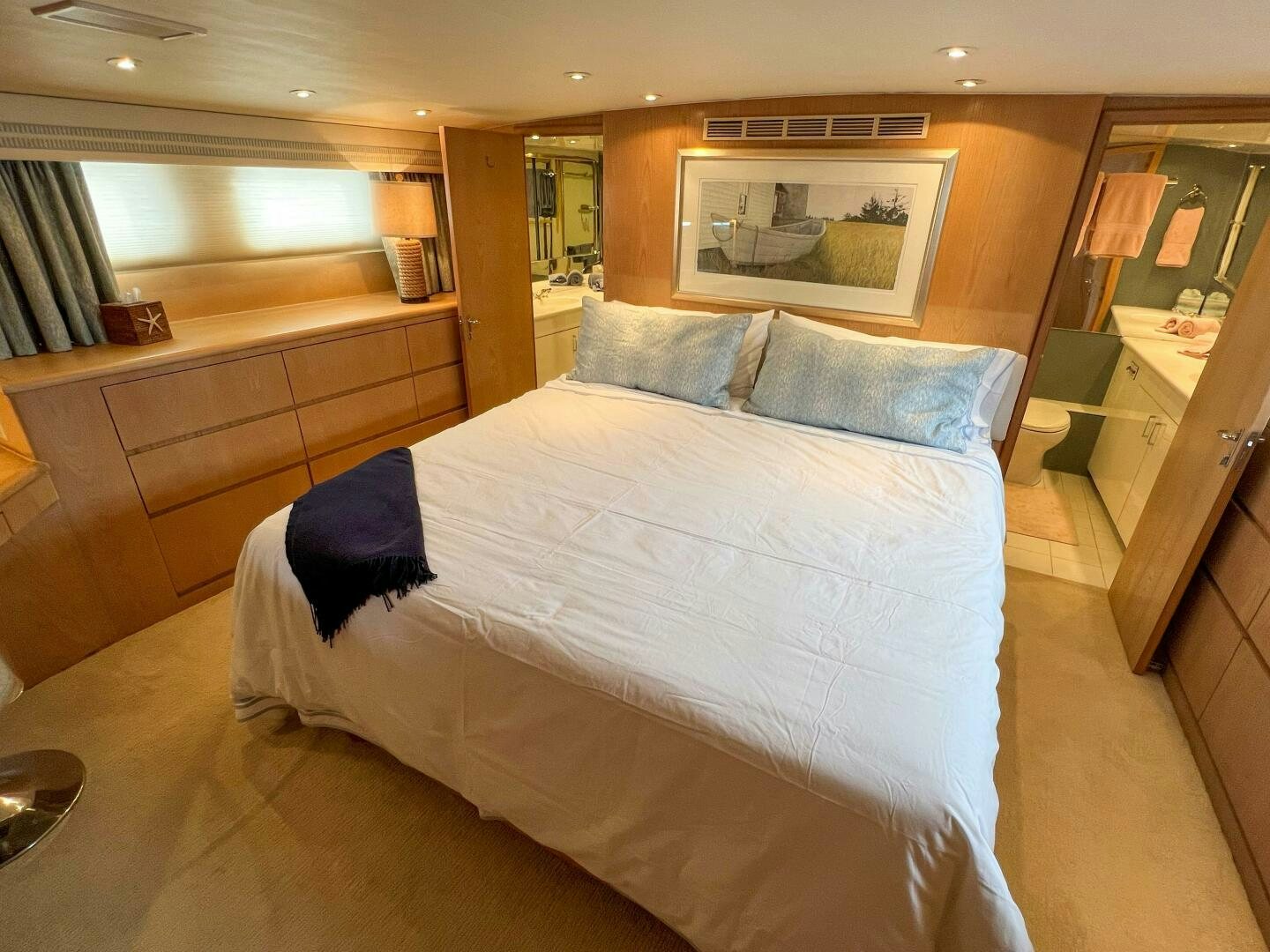 a bed in a room aboard AT EASE Yacht for Sale