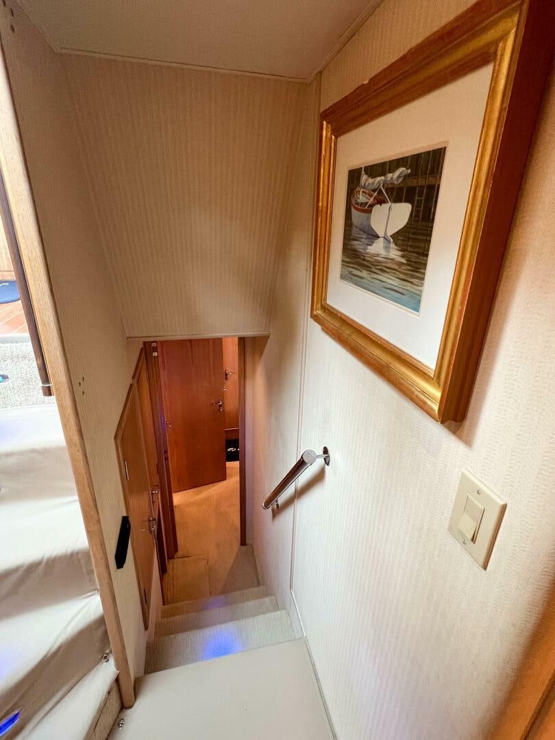 a door with a mirror aboard AT EASE Yacht for Sale