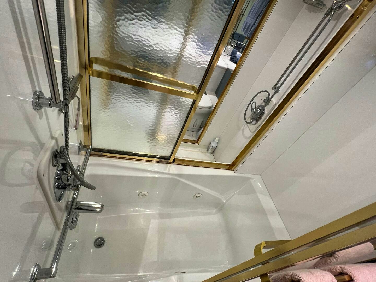 a person holding a book aboard AT EASE Yacht for Sale