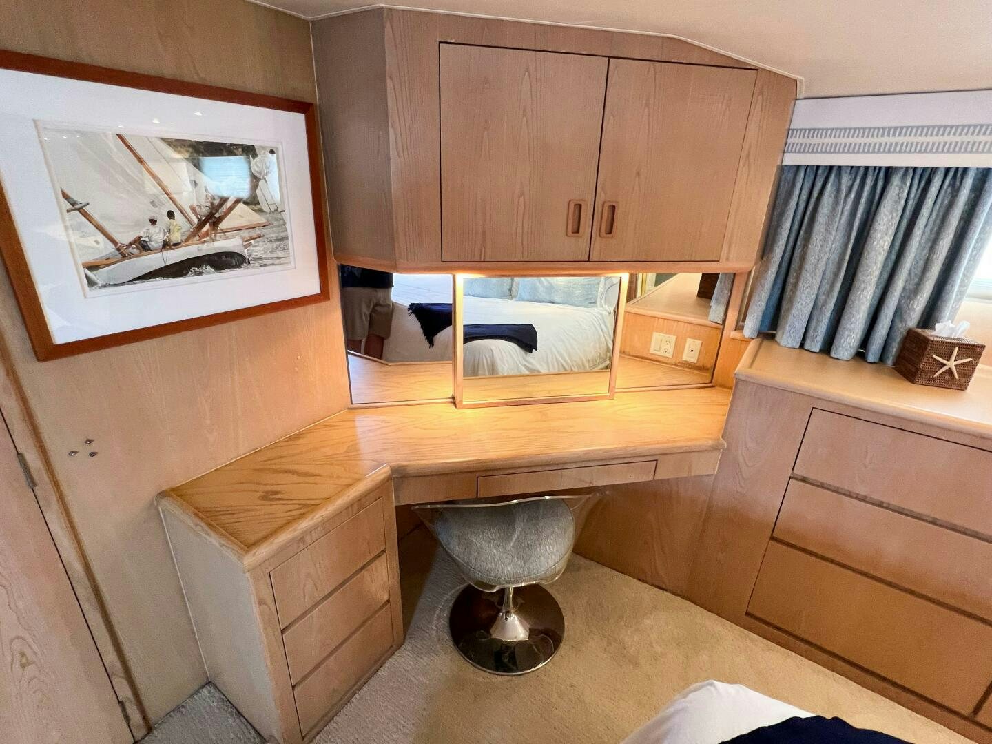 a kitchen with a sink and a large shelf aboard AT EASE Yacht for Sale