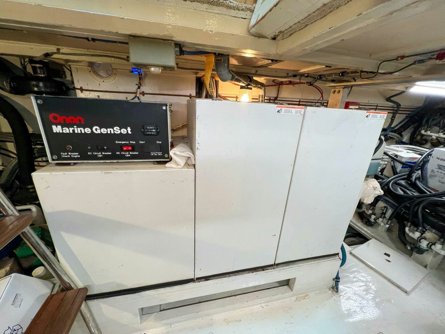 a large white machine aboard AT EASE Yacht for Sale