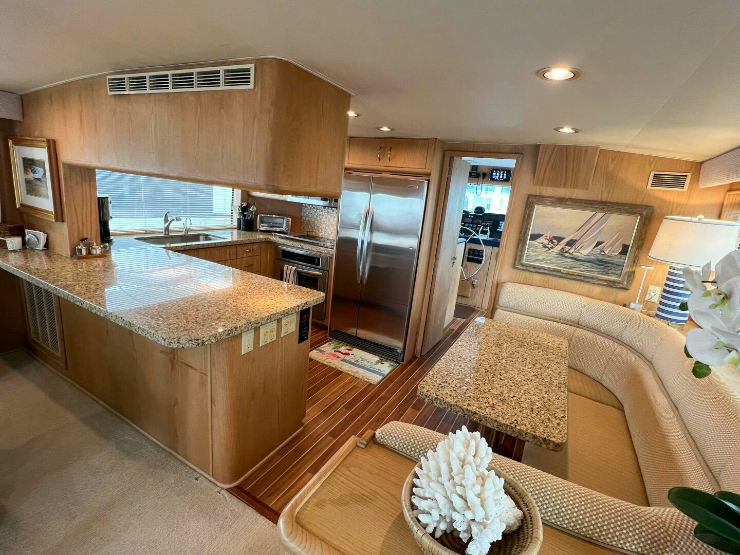 a kitchen and living room aboard AT EASE Yacht for Sale