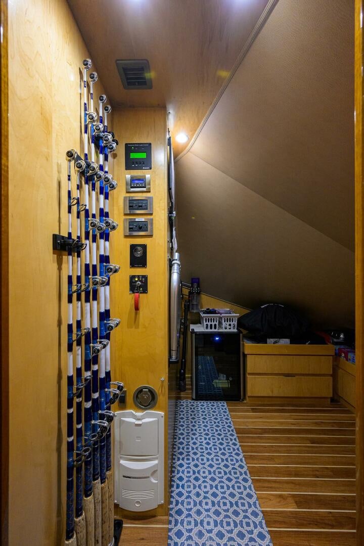 a bathroom with a toilet and a sink aboard CODE BLU Yacht for Sale