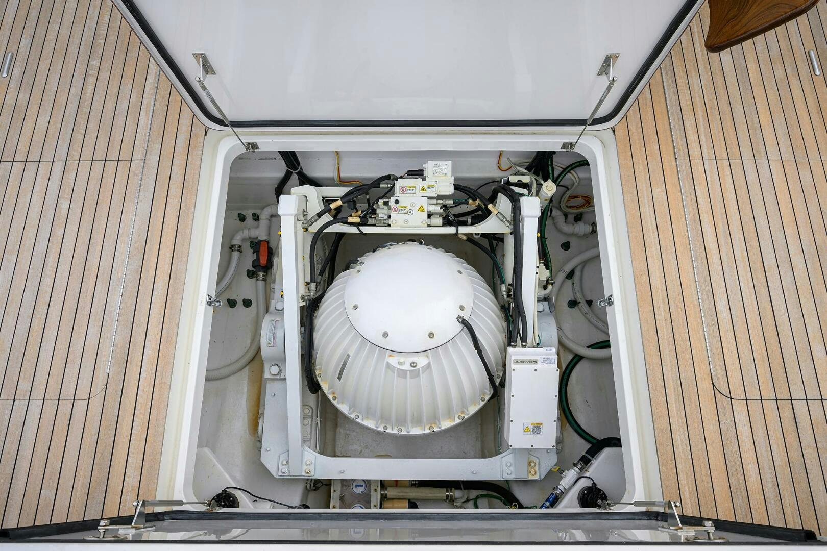 a white machine with a white circle aboard CODE BLU Yacht for Sale