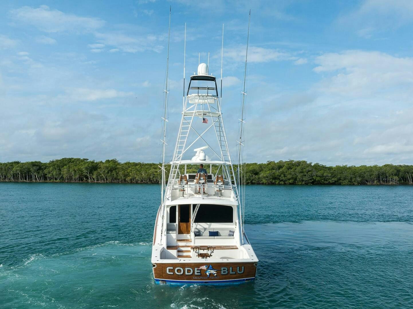 a boat in the water aboard CODE BLU Yacht for Sale