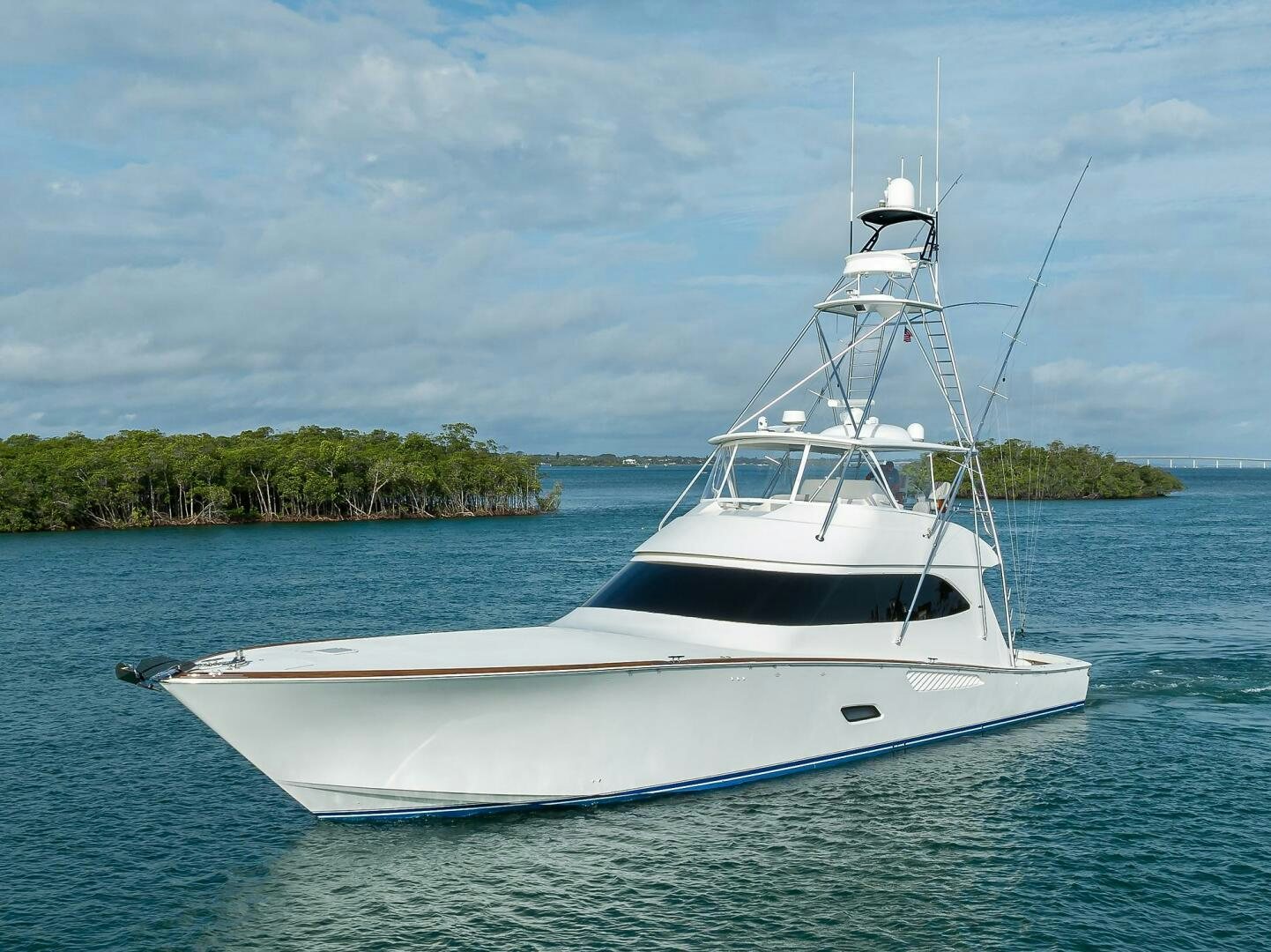 a white boat in the water aboard CODE BLU Yacht for Sale
