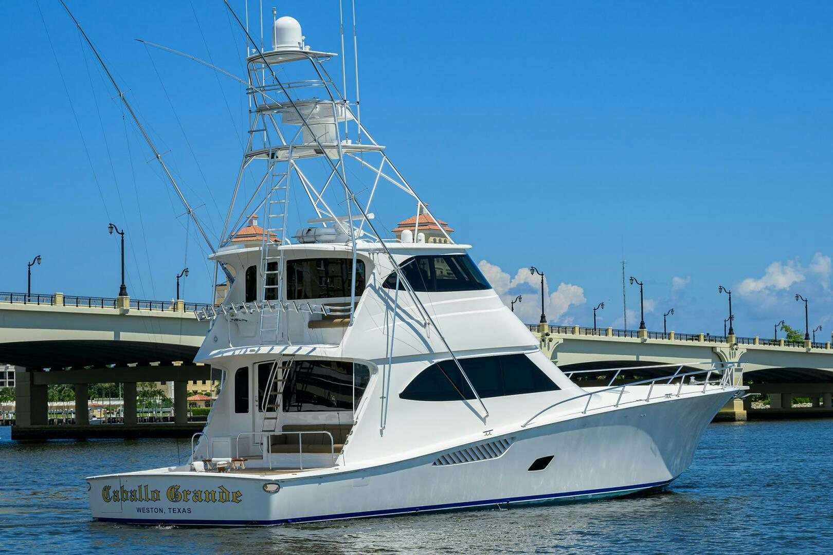 a white boat in the water aboard CABALLO GRANDE Yacht for Sale