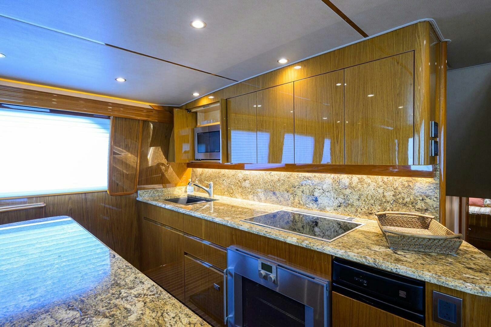 a kitchen with marble counters aboard CABALLO GRANDE Yacht for Sale