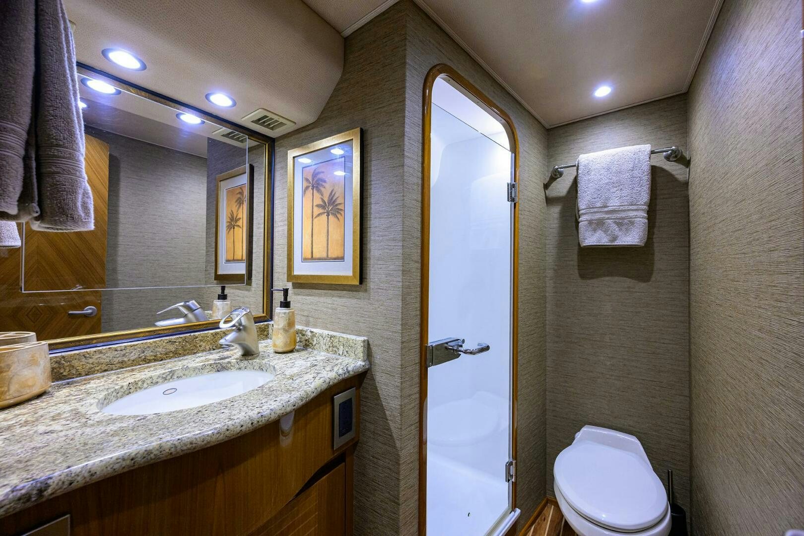 a bathroom with a sink and a toilet aboard CABALLO GRANDE Yacht for Sale