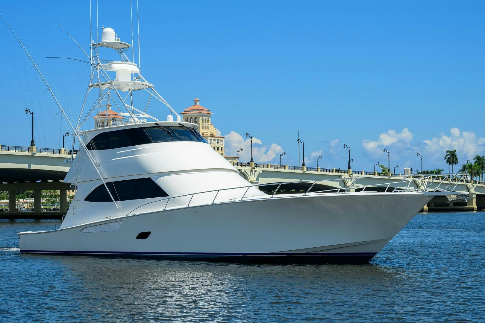 a white yacht in the water aboard CABALLO GRANDE Yacht for Sale