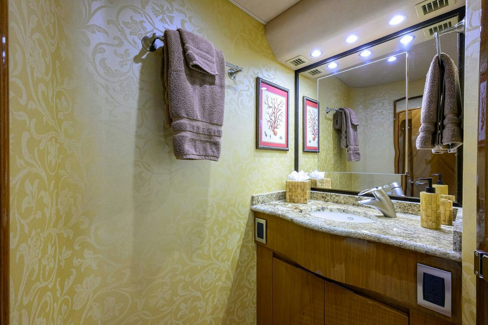 a bathroom with a towel on the wall aboard CABALLO GRANDE Yacht for Sale