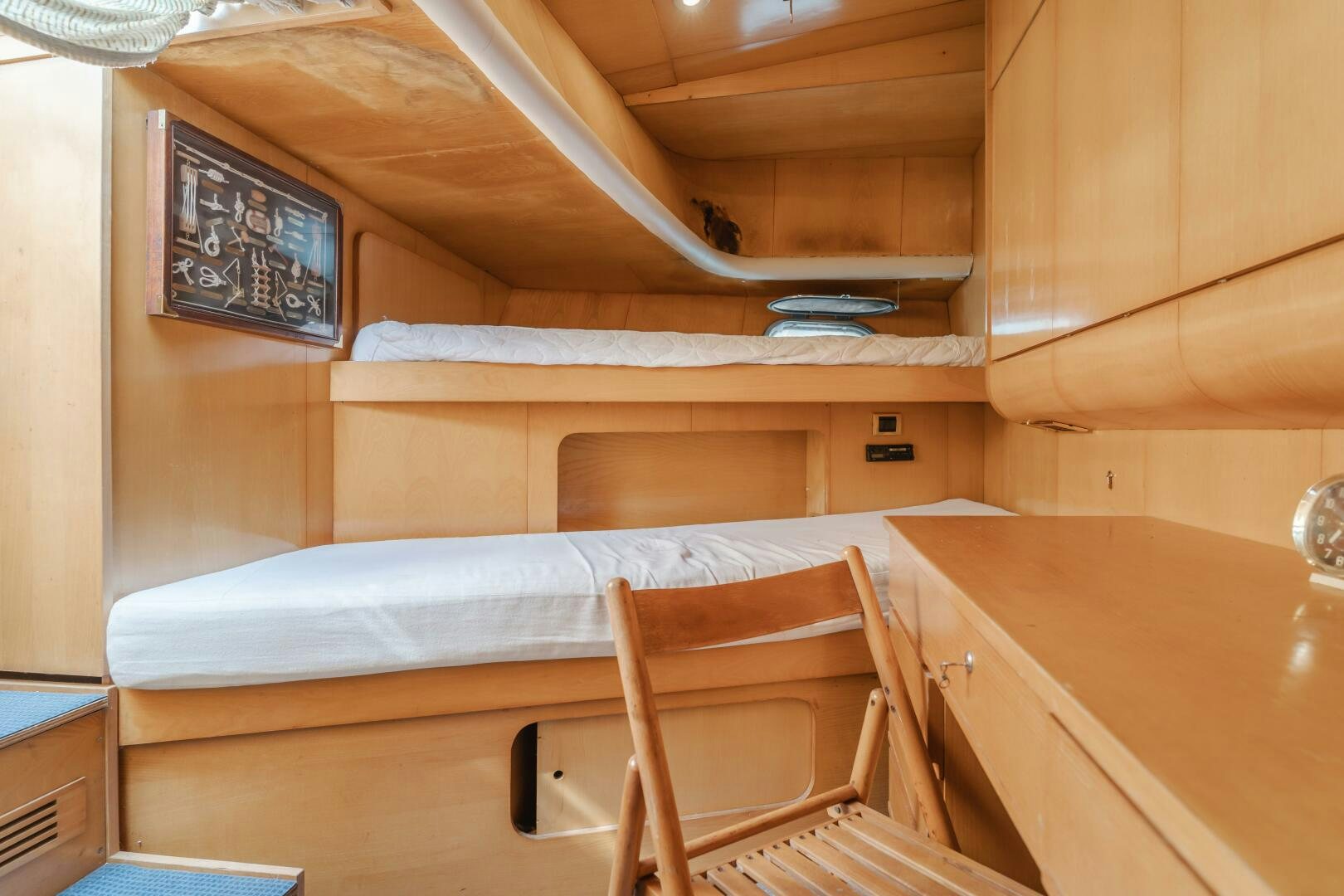 a bed in a room aboard C LADY Yacht for Sale