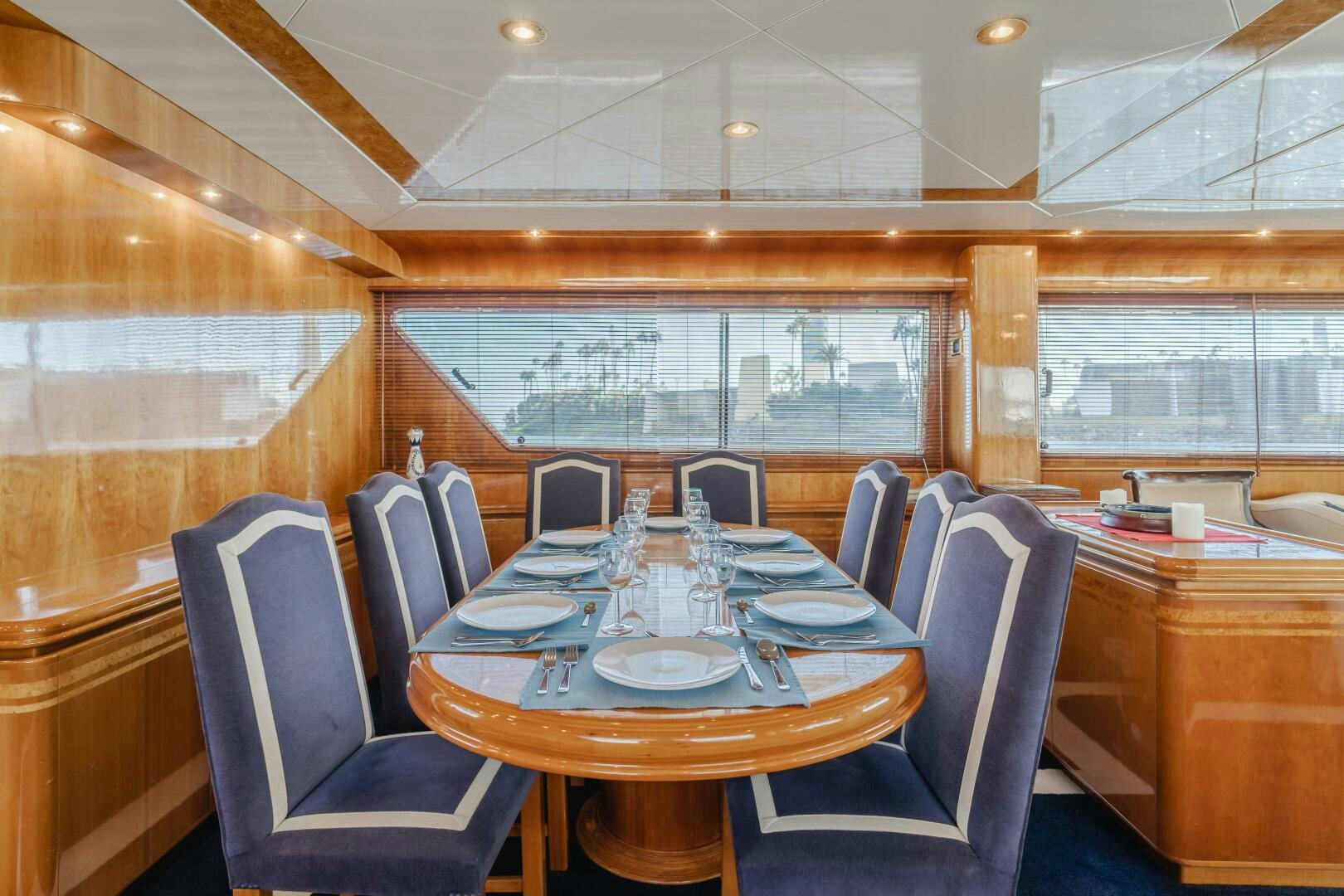 a dining room with a table aboard C LADY Yacht for Sale