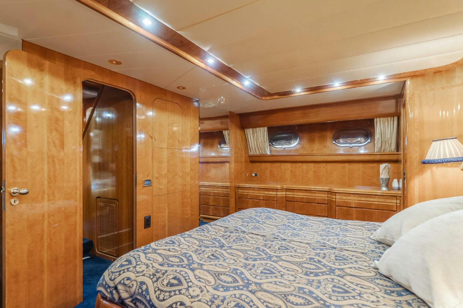 a bed in a room aboard C LADY Yacht for Sale