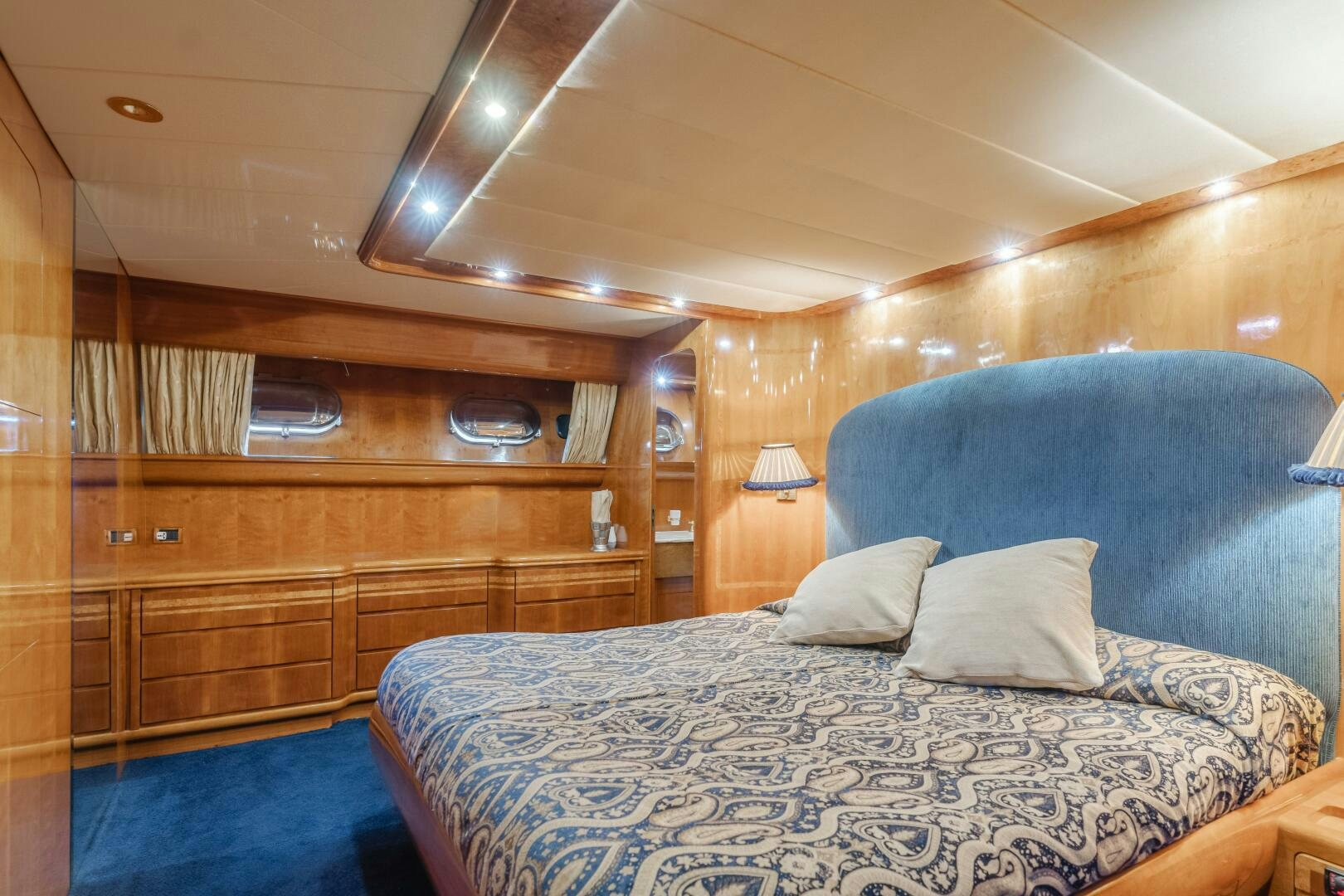 a bed in a room aboard C LADY Yacht for Sale