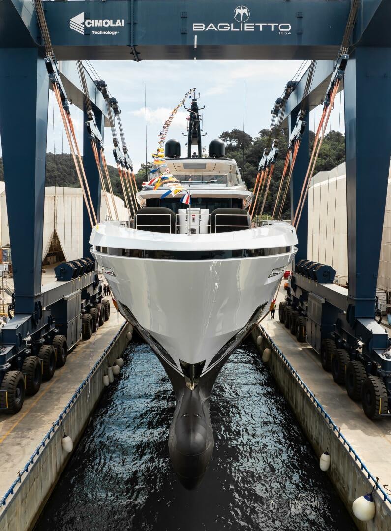 a large white boat in a warehouse aboard BAGLIETTO T52 HULL 4 Yacht for Sale