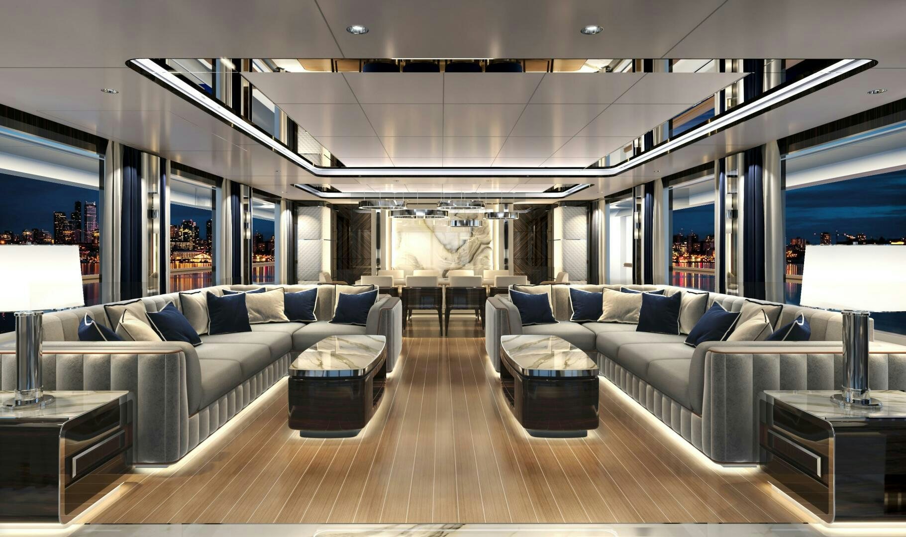 a living room with a large sofa aboard BAGLIETTO T52 HULL 4 Yacht for Sale