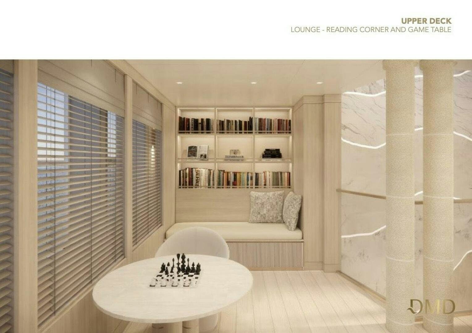 a living room with a couch and a table aboard JOY Yacht for Sale