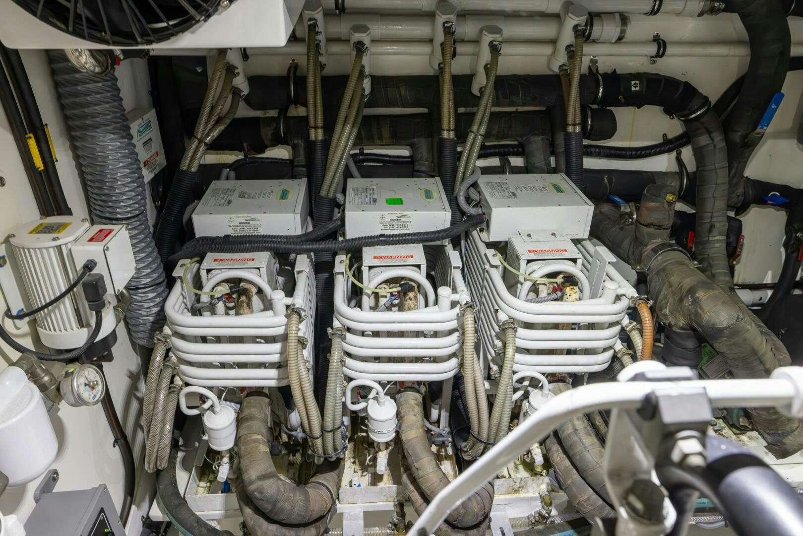 a close-up of a car engine aboard INDIGO Yacht for Sale