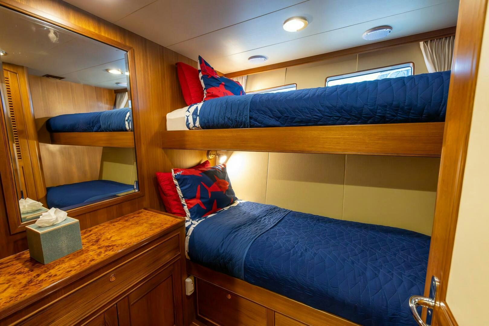 a room with bunk beds aboard INDIGO Yacht for Sale