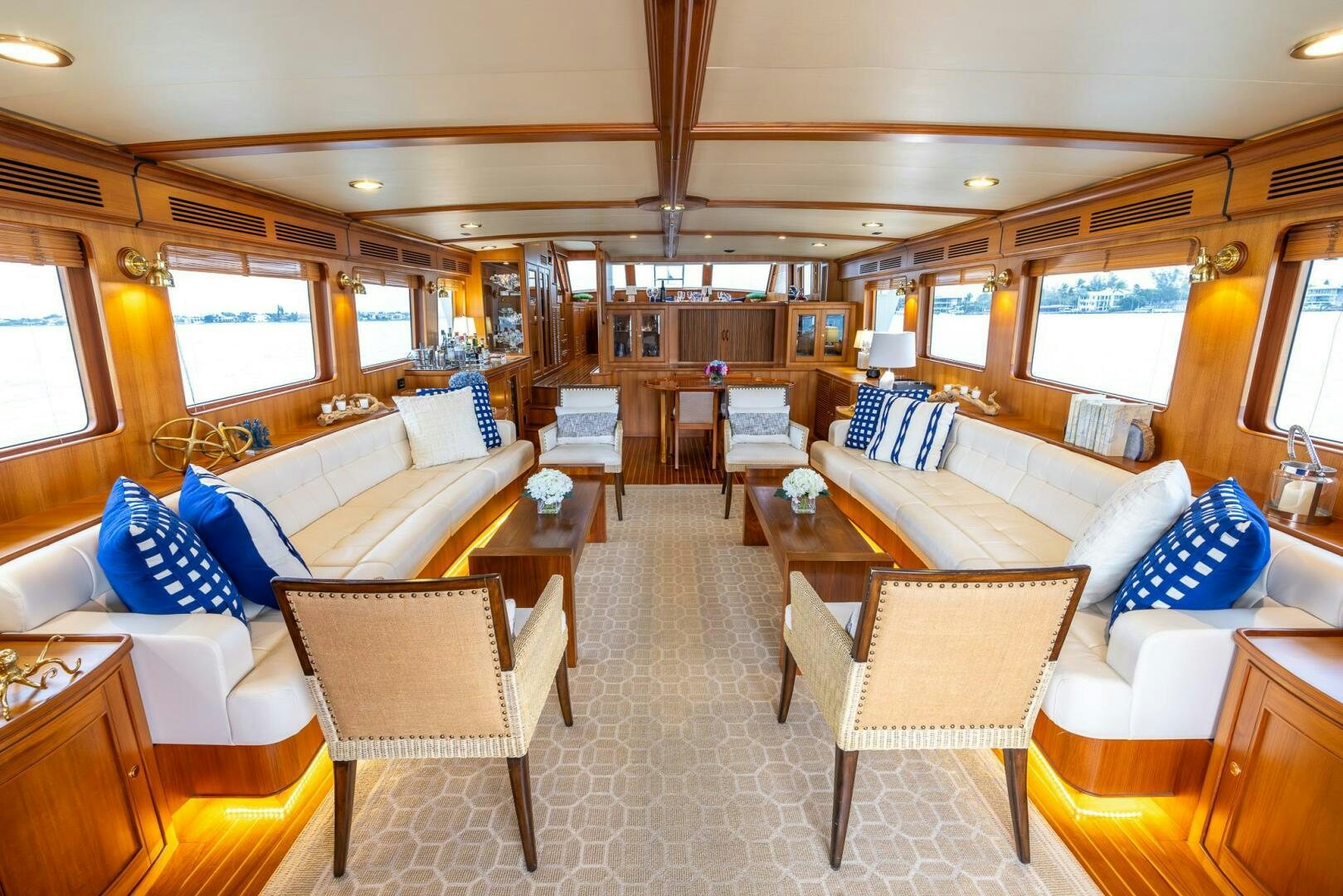 a large living room with a large window aboard INDIGO Yacht for Sale