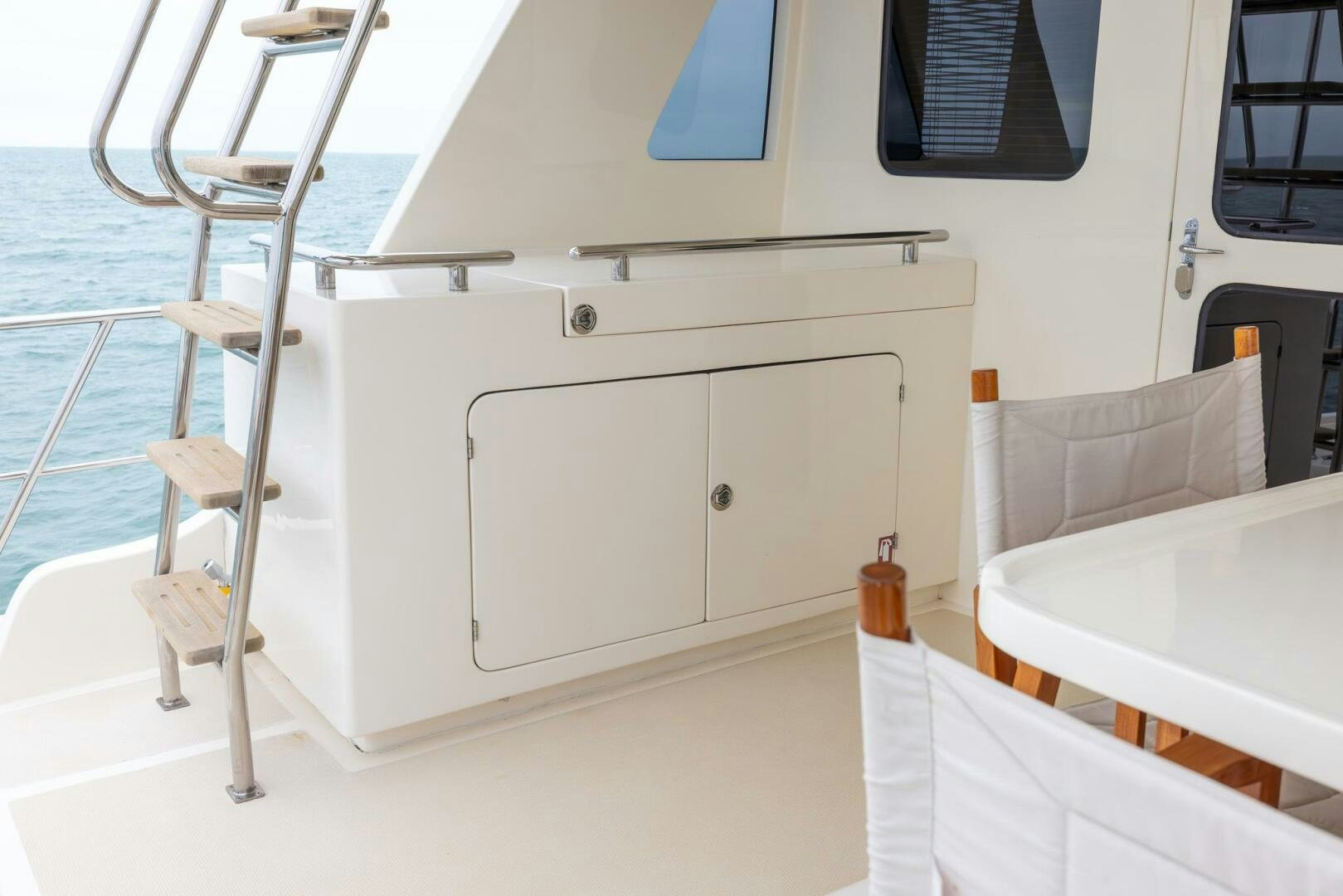 a boat with a ladder aboard INDIGO Yacht for Sale